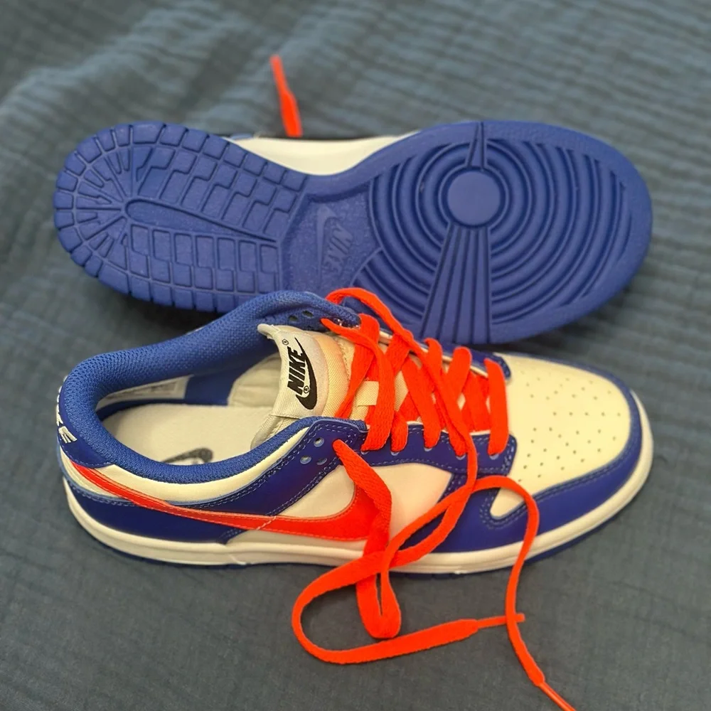 Nike White and Blue Sneakers with orange Accents - Picture 2 of 3